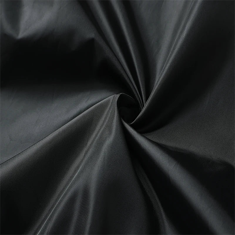 Close-up of black fabric with folds