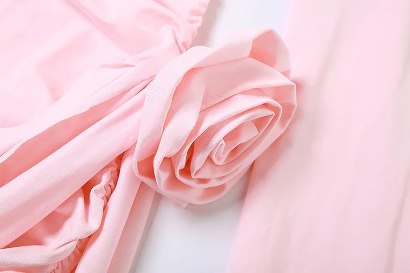 Pink fabric with a soft texture on a light background