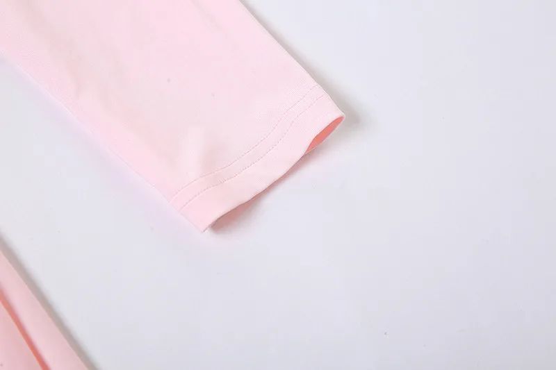 Pink fabric on a light gray background