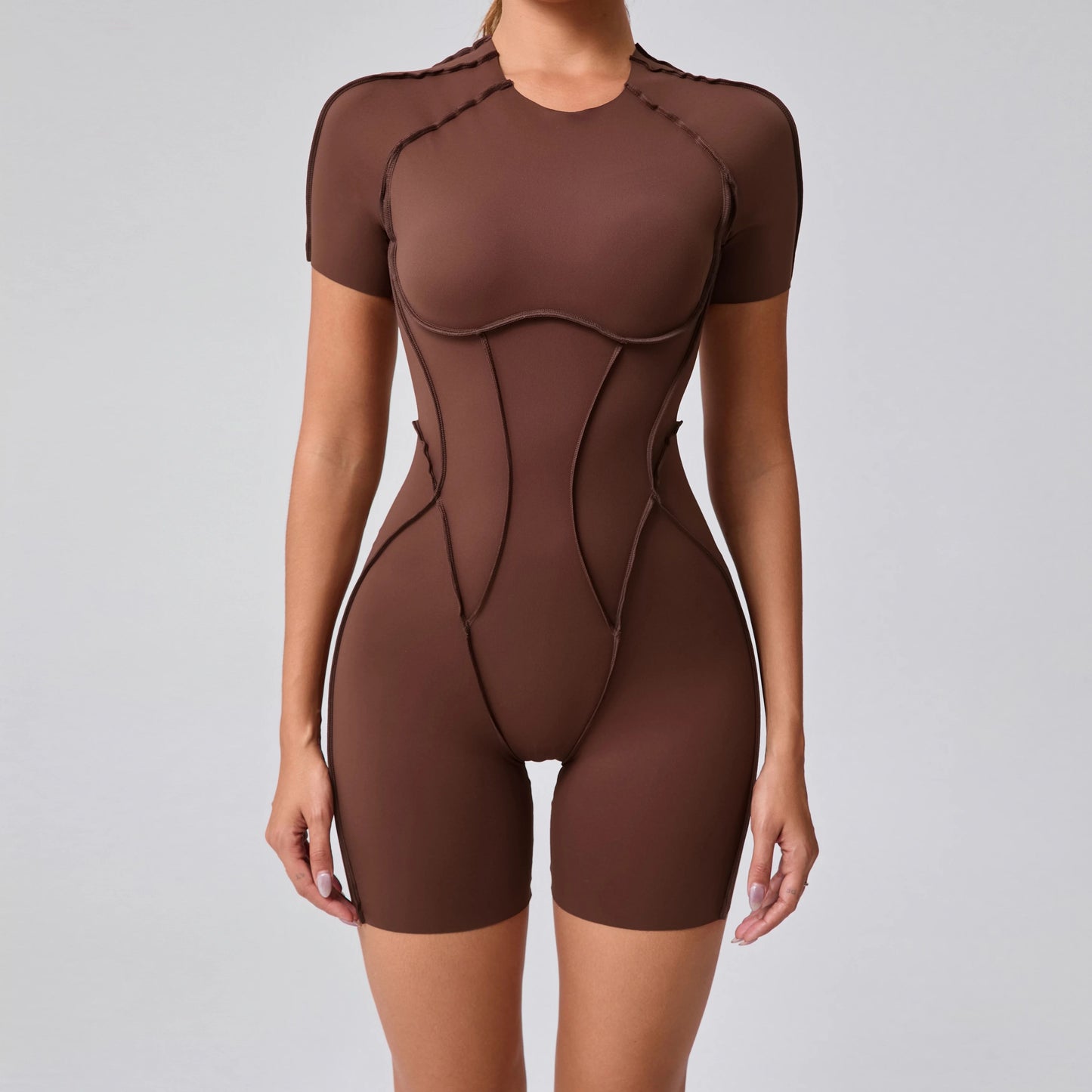 Brown bodysuit on a plain background