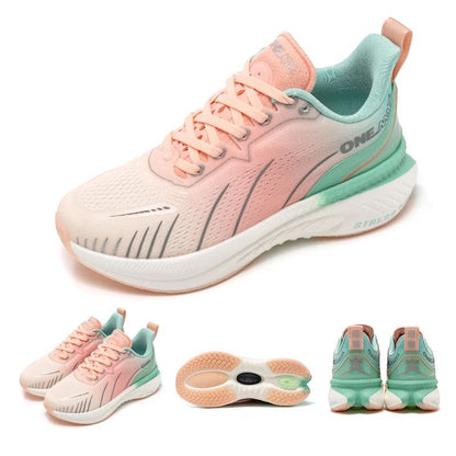 Pink and green running shoe with additional angles on a white background