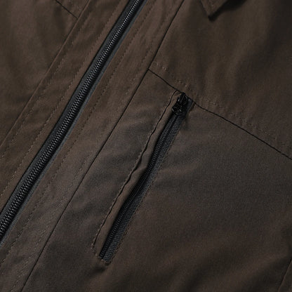 Close-up of a brown jacket with a zipper