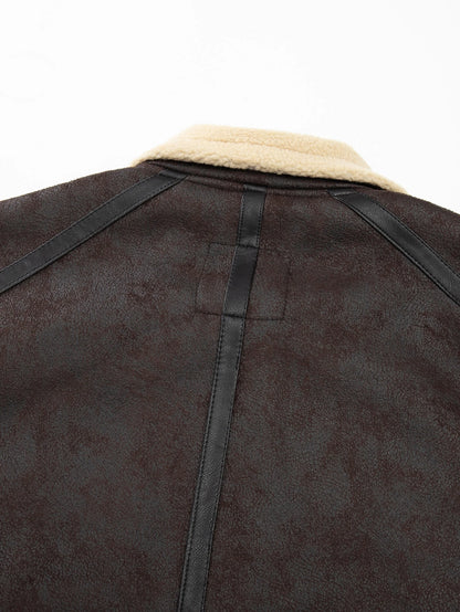 Brown leather jacket with beige fur lining on a white background