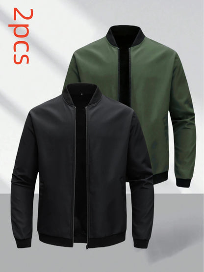 Two bomber jackets, one black and one green, on a light gray background.