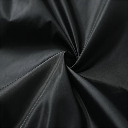 Close-up of black fabric with folds