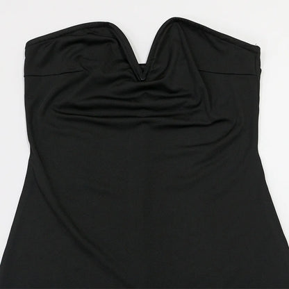 Black strapless dress on a white background