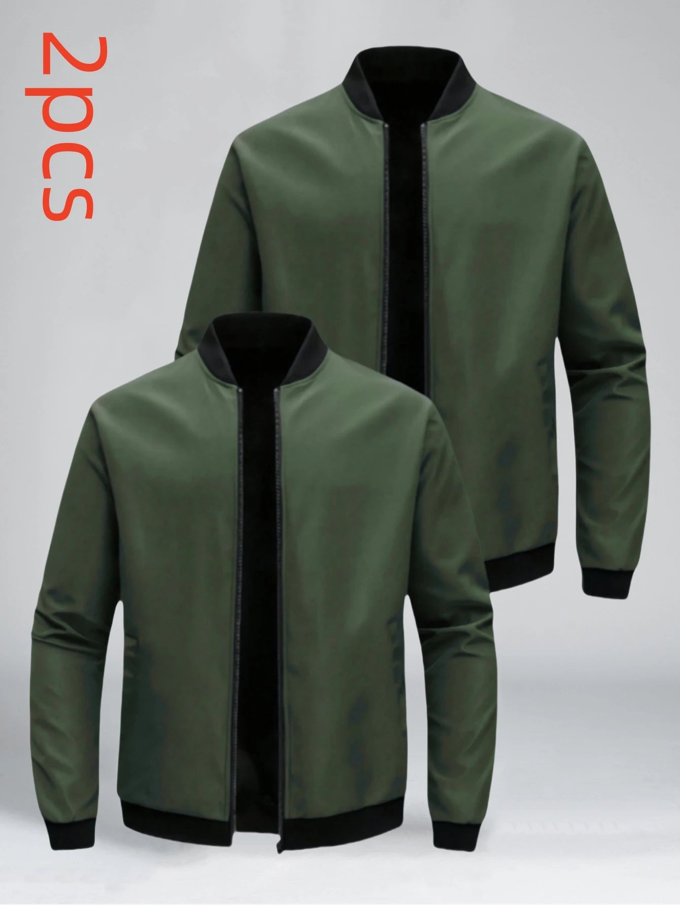 Two green jackets with black trim on a light gray background