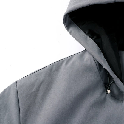 Close-up of a gray hooded jacket on a white background